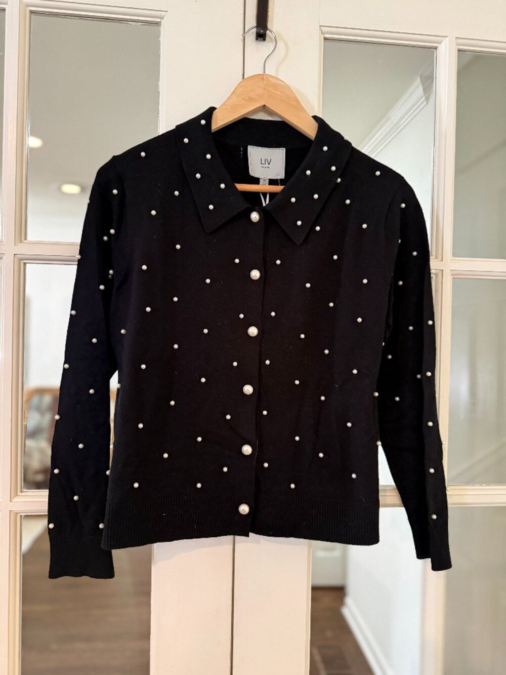 Black cardigan sweater with pearls, size Medium, new with tags
